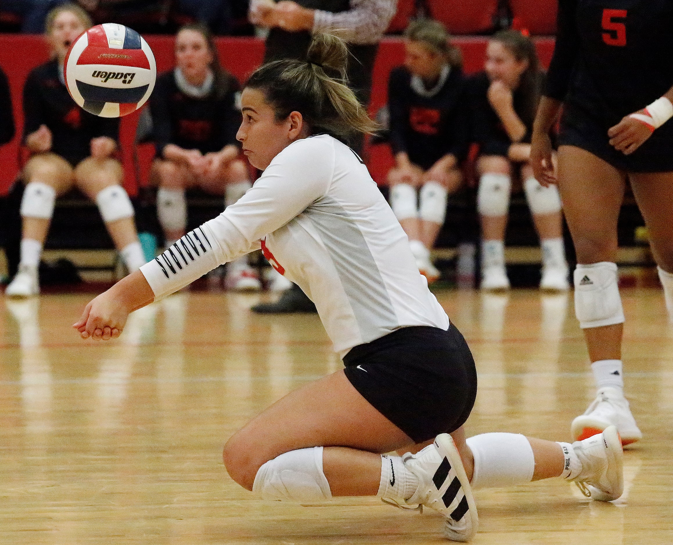 Lovejoy High School libero Callie Kemohah (3) receives a hit during game three as Grapevine...