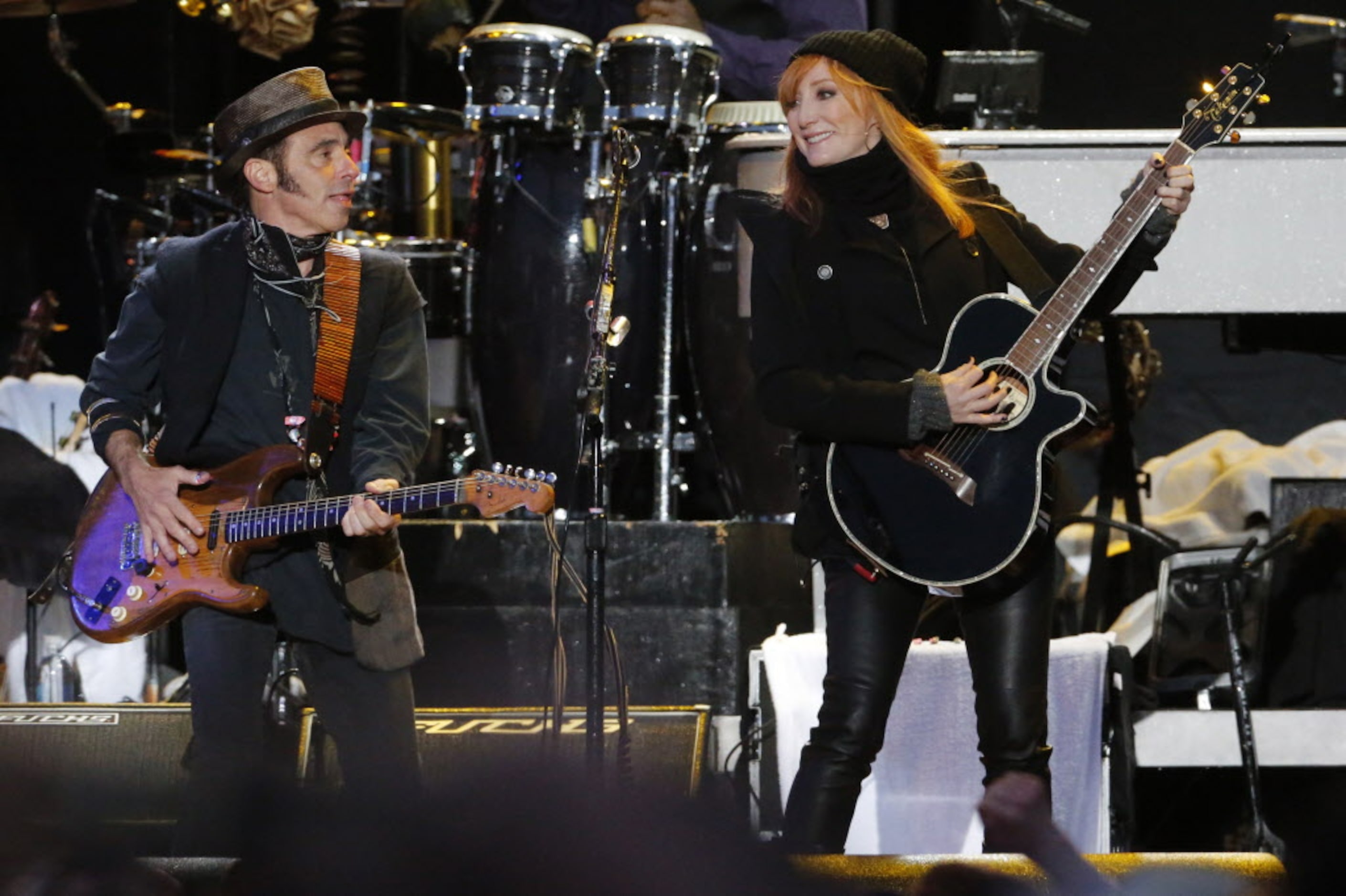 The E Street Band's Nils Lofgren and Patti Scialfa perform with Bruce Springsteen during the...