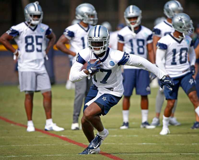 Cowboys wide receiver Allen Hurns runs after a catch during afternoon practice at the...