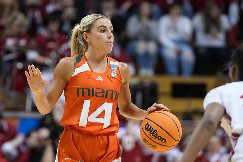 Miami's Haley Cavinder dribbles during the second half of a second-round college basketball...
