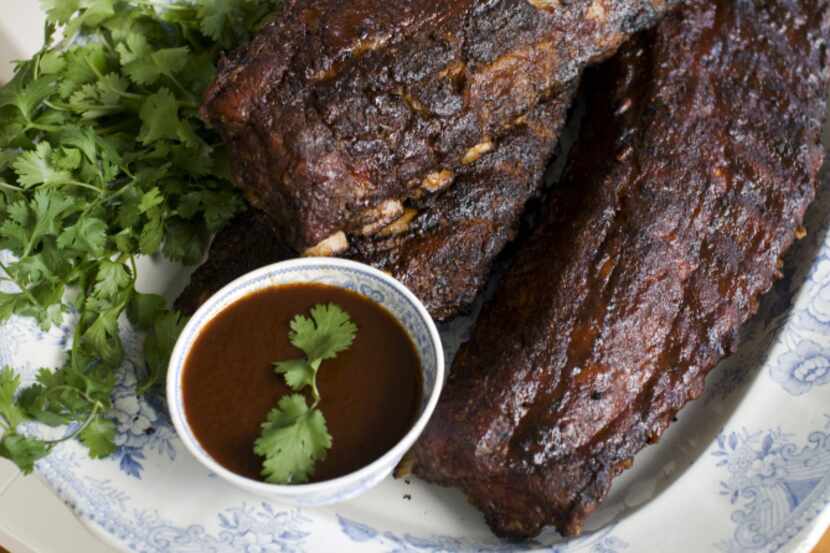 In this image taken on June 3, 2013, Bubbaa's Bunch barbecued baby back ribs are shown in...