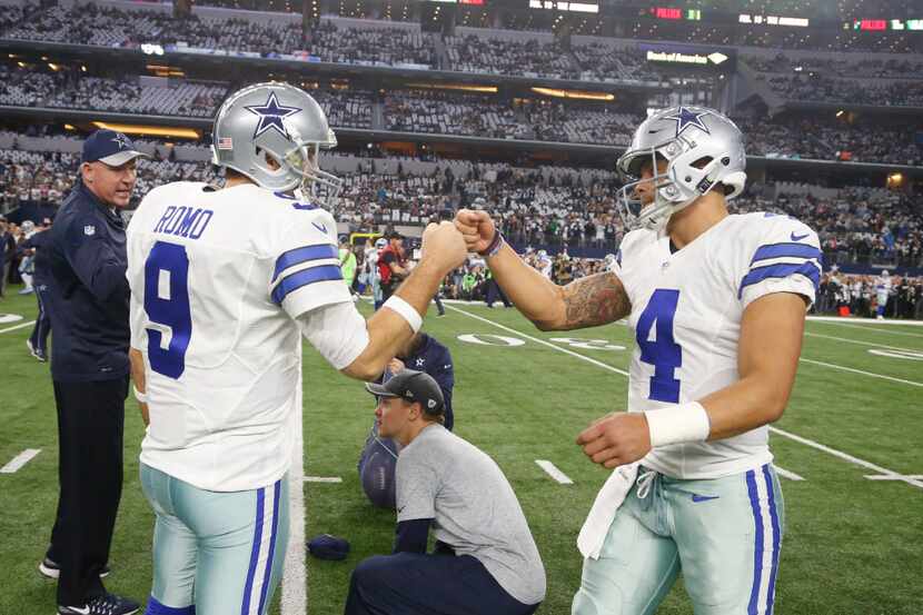 FILE - In this Jan. 15, 2017, file photo, Dallas Cowboys' Tony Romo talks to Dak Prescott...