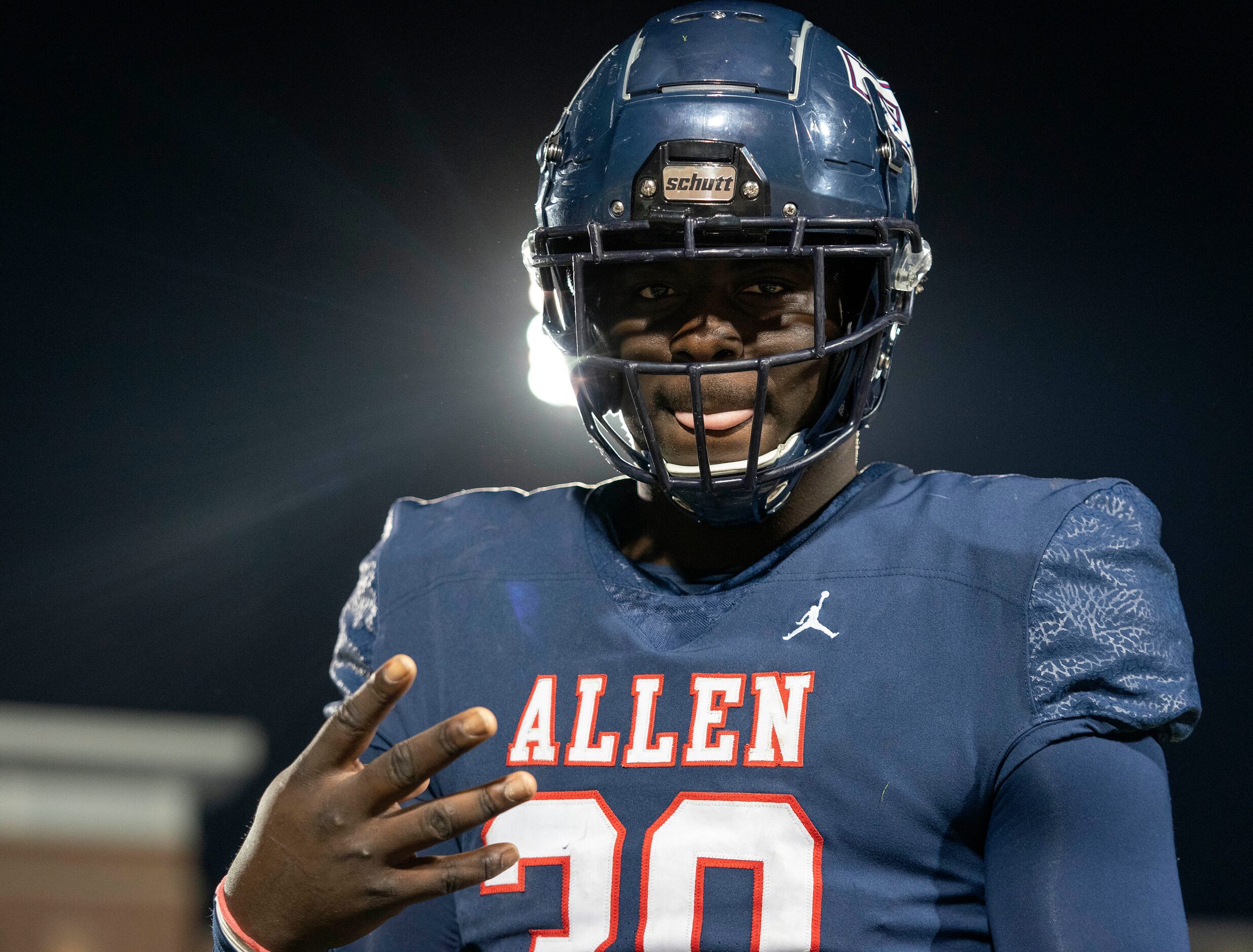 Allen junior defensive lineman DJ Hicks (30) poses for the camera on the sidelines during...