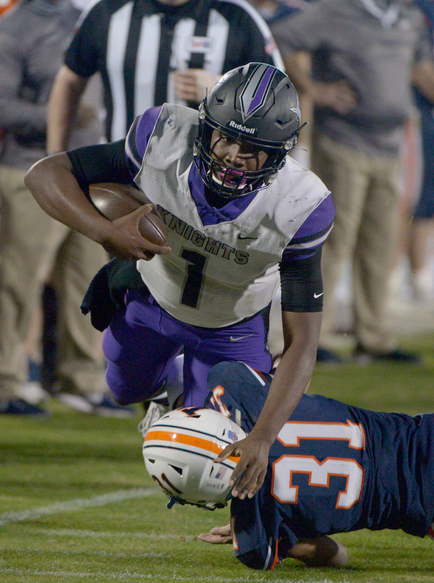 Frisco Independence’s Braylon Braxton (1) jumps over Wakeland’s Andrew Cox (31) in the...