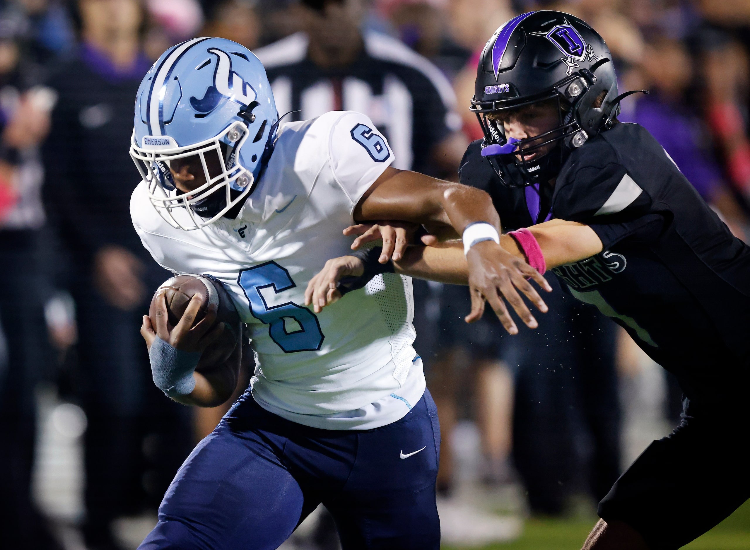 Frisco Emerson running back Nick Clark (6) eludes Frisco Independence defensive back Noah...