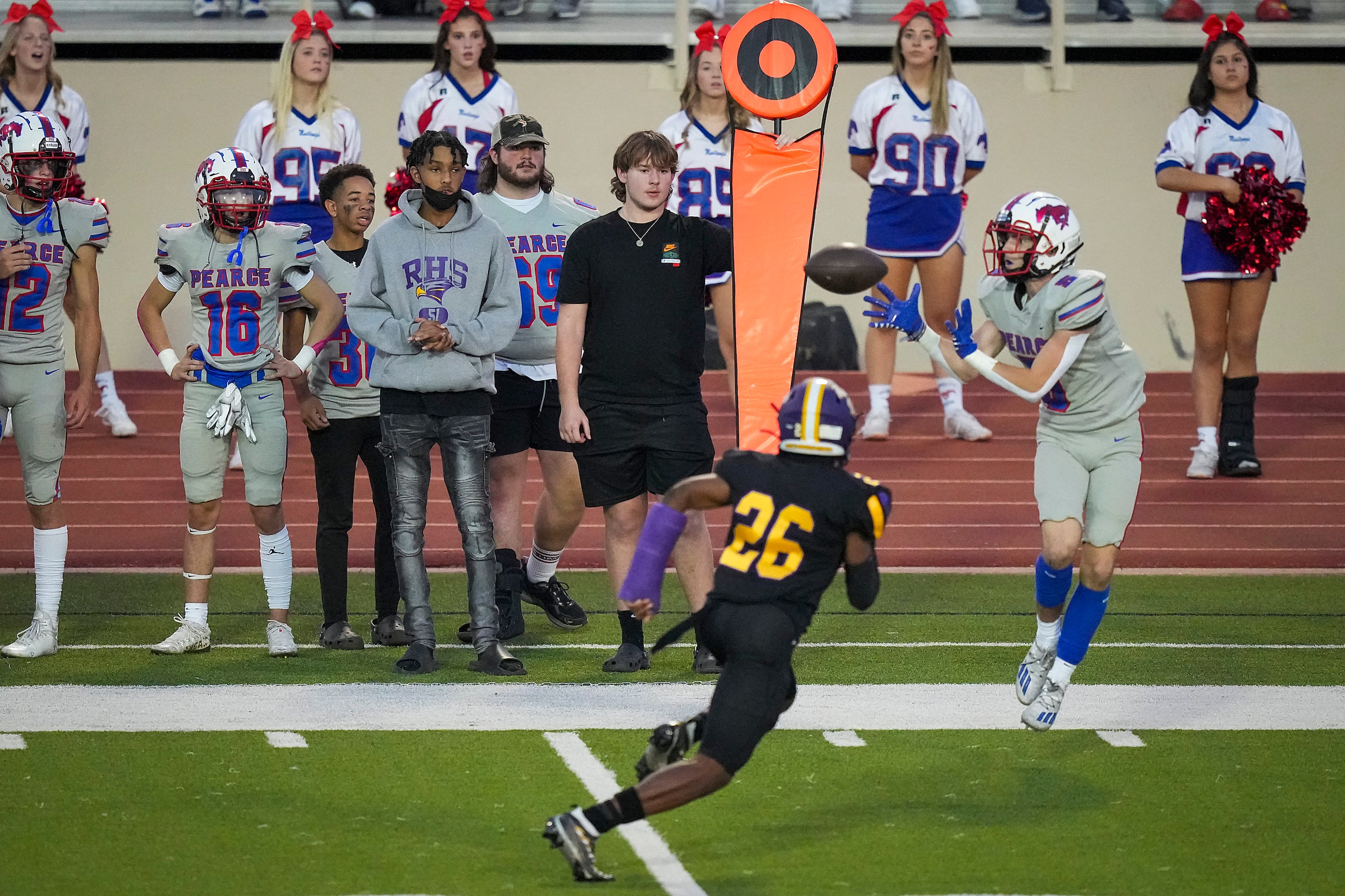 Richardson wide receiver Pearce Jack McGarry (5) makes a catch past Richardson’s Leon...