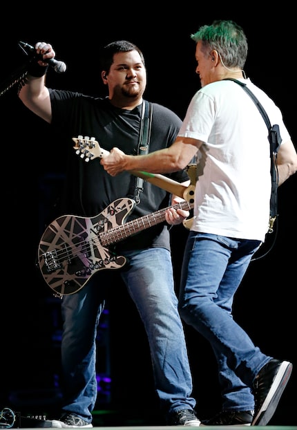 Wolfgang Van Halen (left) and his guitar god dad (G.J. McCarthy/The Dallas Morning News)