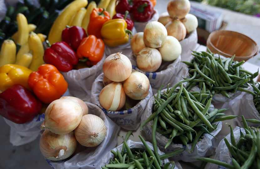 Fresh produce offered at the the Collin County Farmers Market in Plano, which was having...