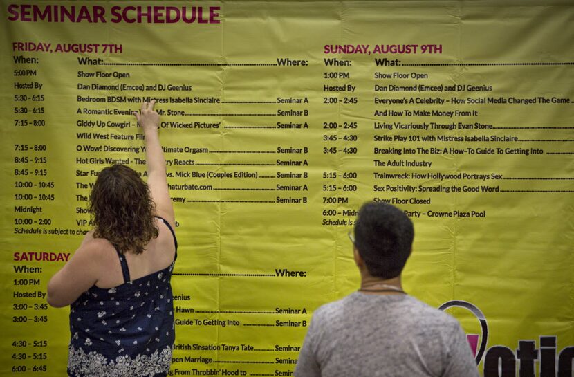 Shelly Burroughs of Princeton, Texas, looks over a schedule during the since ousted...