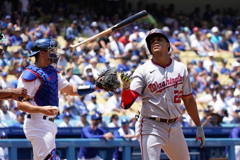 Washington Nationals' Juan Soto flips his bat after striking out during the fourth inning of...