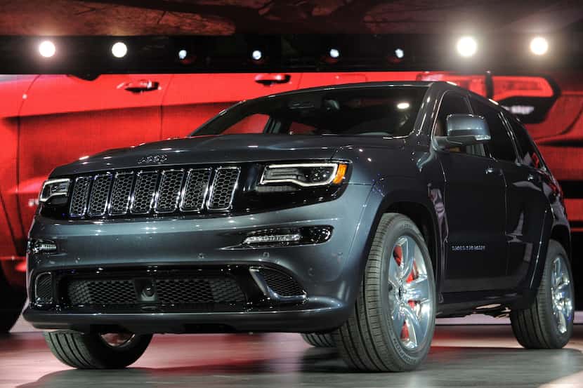 (FILES)The 2014 Jeep Grand Cherokee SRT high performance version is introduced at the 2013...