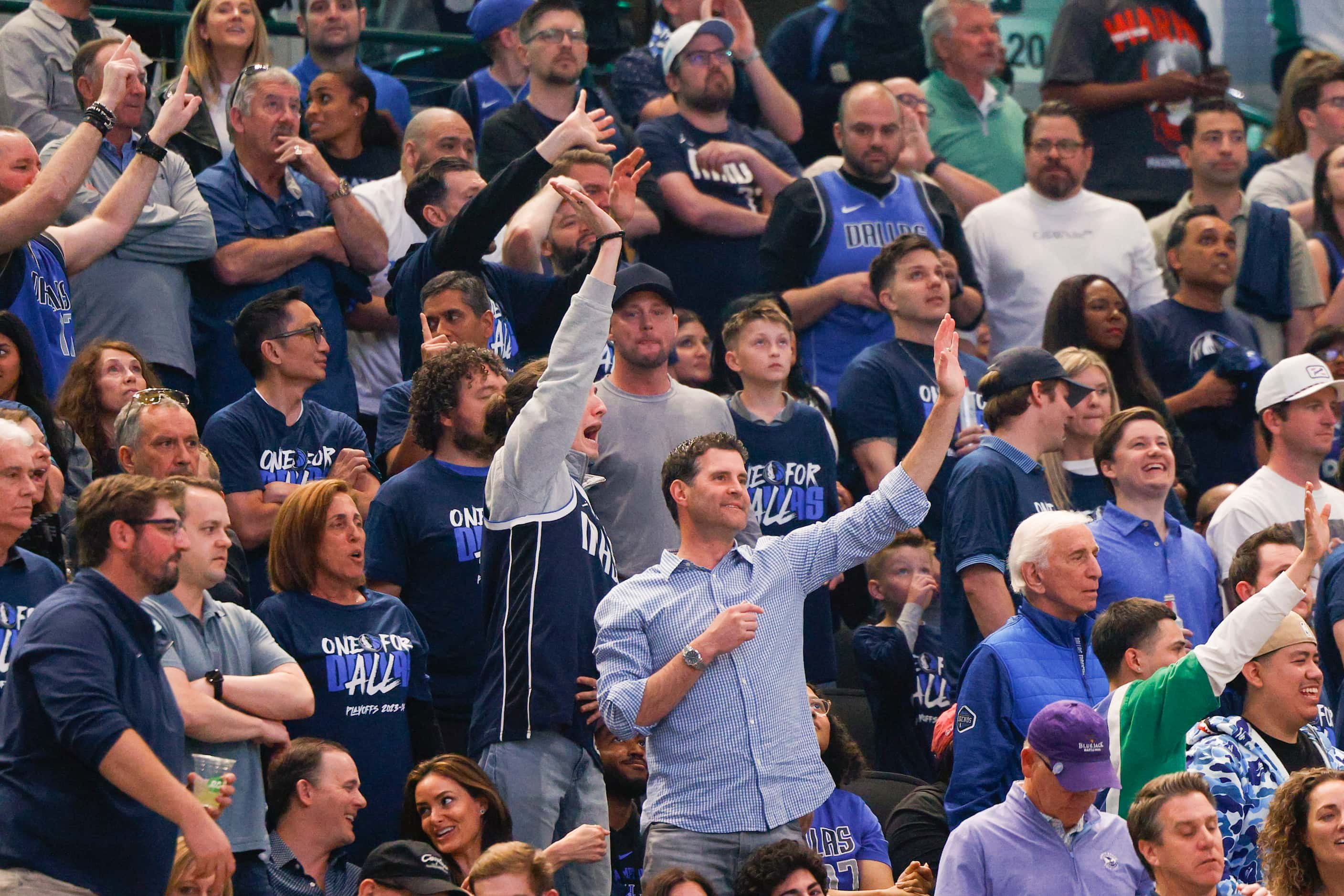 Dallas Mavericks fans wave goodbye to LA Clippers guard Russell Westbrook after he fouled...