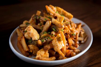This? That's queso poutine -- a pile of fries and cheese.