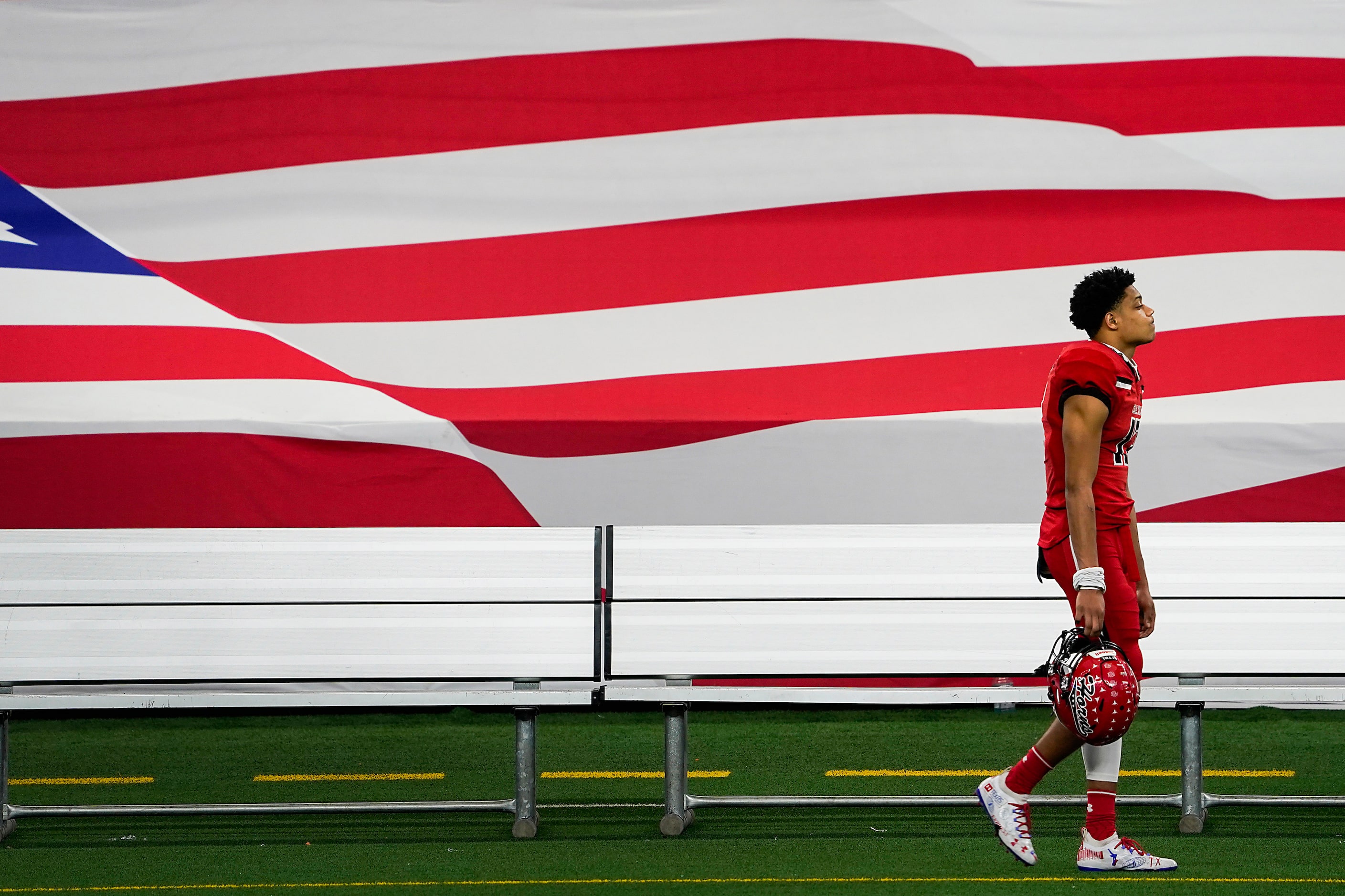 Cedar Hill wide receivers Javien Clemmer leaves the field after a loss to Katy in the Class...