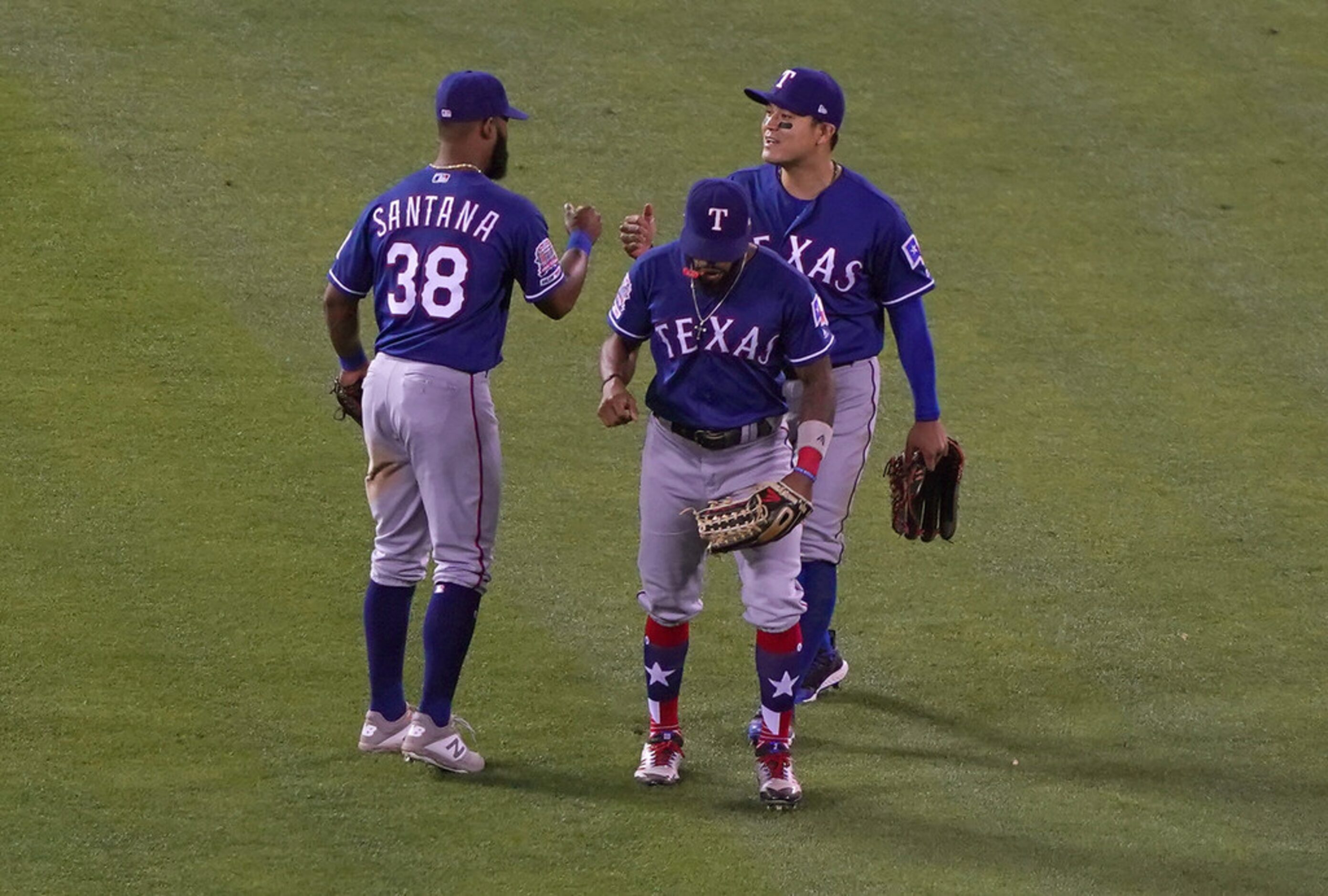 OAKLAND, CA - JULY 25:  Danny Santana #38, Delino DeShields #3 and Shin-Soo Choo #17 of the...