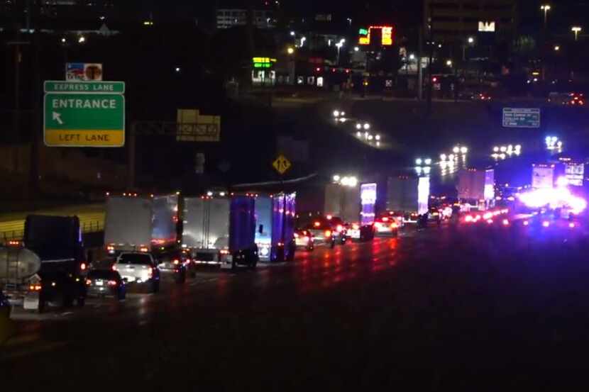 Traffic was at a standstill along Interstate 635 in far northeast Dallas while police and...