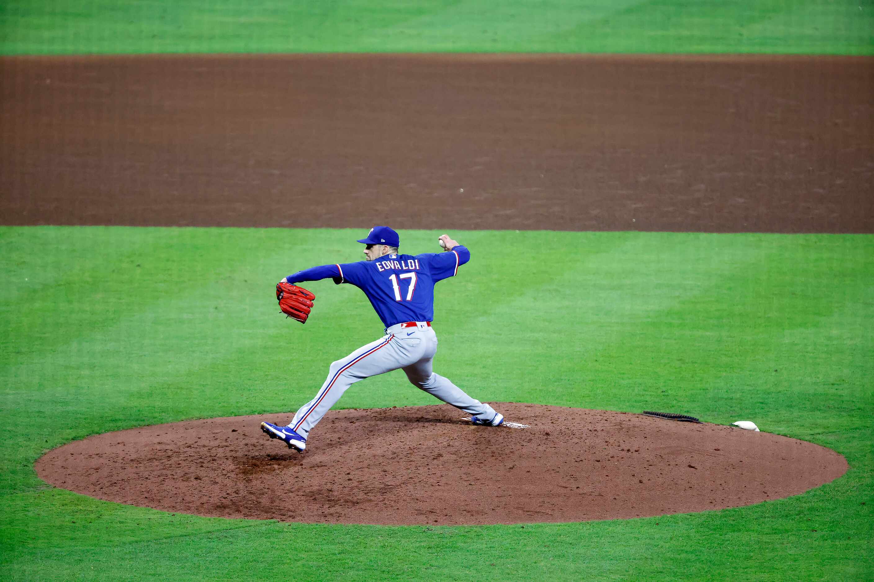 Texas Rangers starting pitcher Nathan Eovaldi (17) throws in the third inning during Game 6...