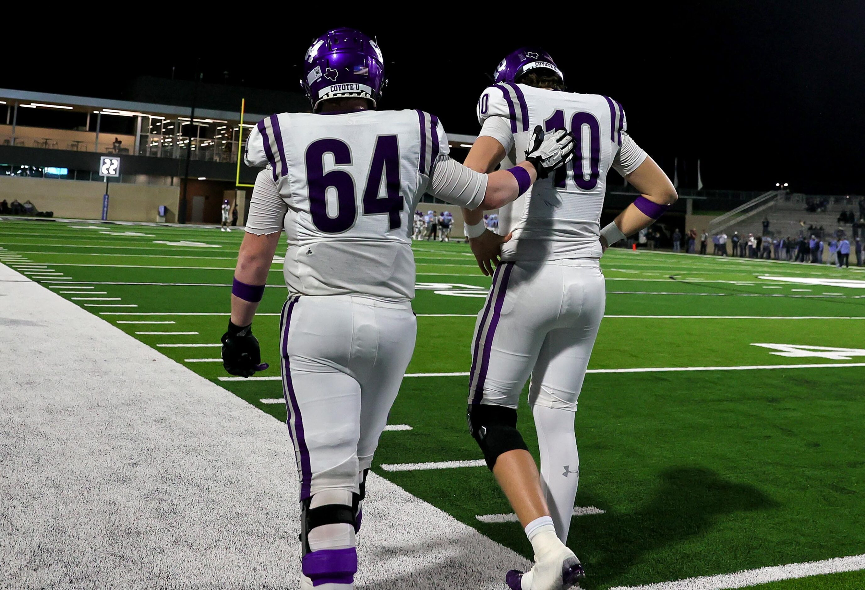 Anna center Cooper Mosier (64) and quarterback Evan Bullock (10) walk off the field after...