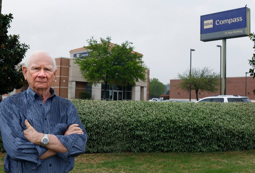 Philip Ham in front of BBVA Compass Bank. He accused Compass of harm because he withdrew...