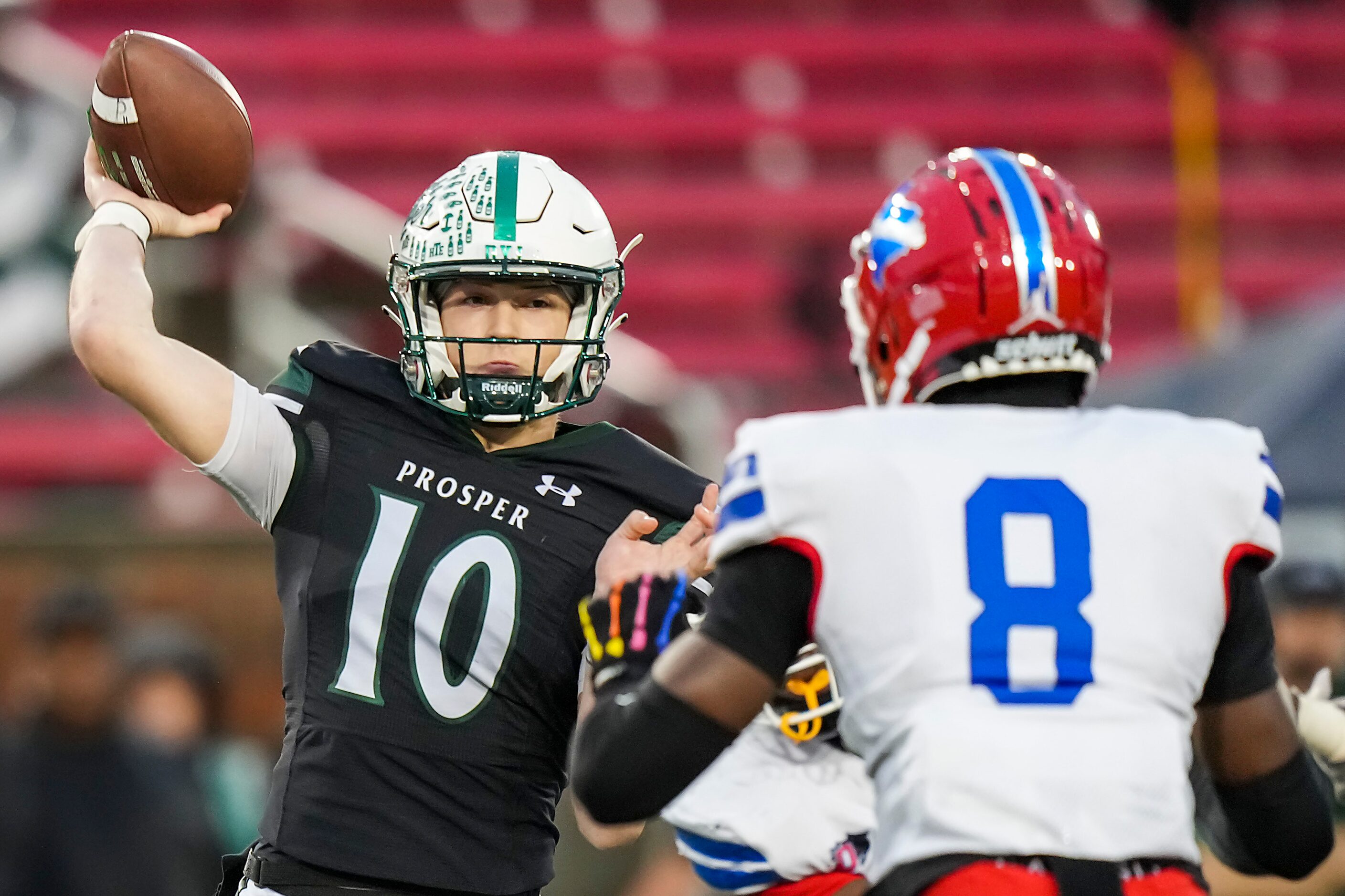 Prosper quarterback Harrison Rosar (10) throws a pass over Duncanville defensive lineman...