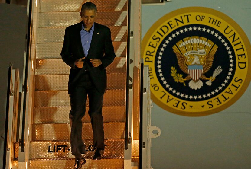  President Obama walks down the stairs of Air Force One upon his arrival at Dallas Love...