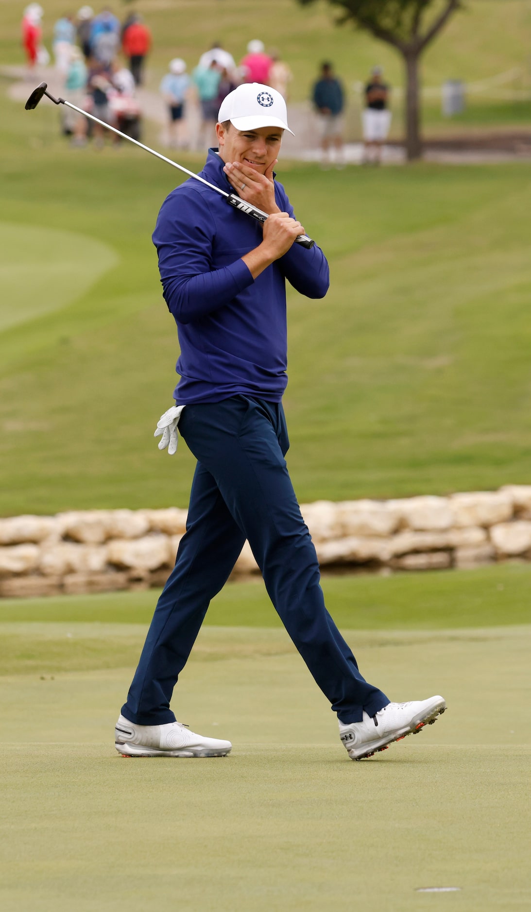 Jordan Spieth reacts after finishing up on the 18th hole during round 2 of the AT&T Byron...