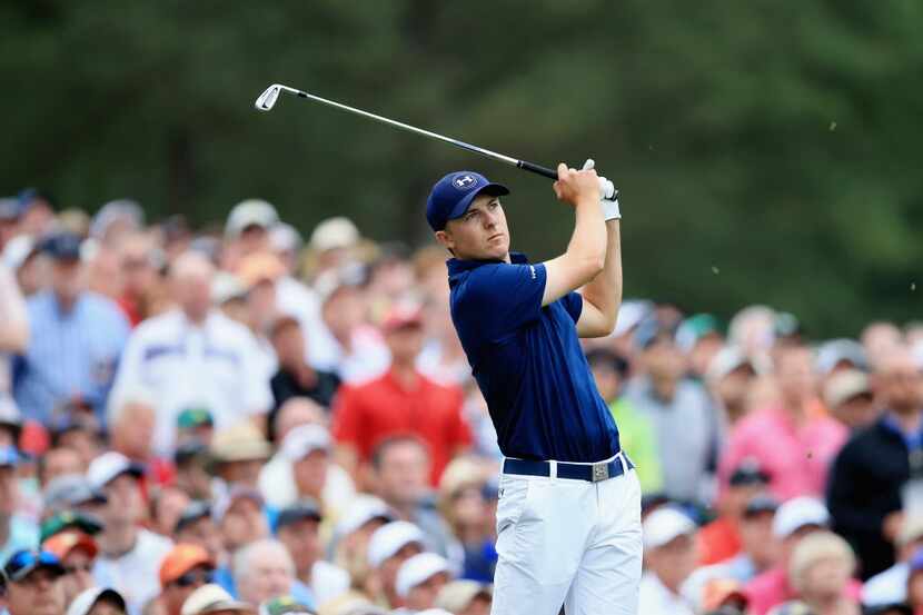 AUGUSTA, GA - APRIL 12:  Jordan Spieth of the United States hits his tee shot on the 12th...