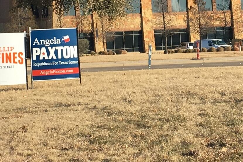 These campaign signs are along Custer Road for Texas Senate candidates Phillip Huffines and...