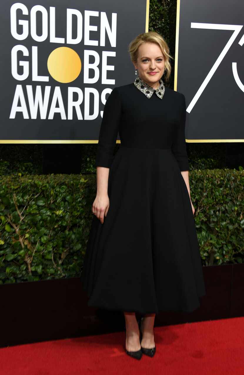 Actress Elisabeth Moss arrives for the 75th Golden Globe Awards on January 7, 2018, in...