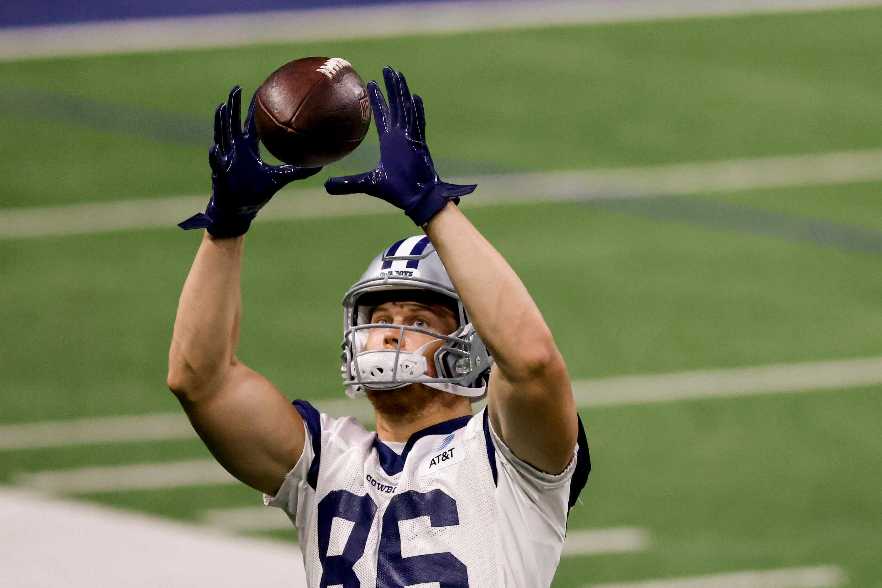 Dallas Cowboys tight end Luke Schoonmaker (86) catches a pas during the team's OTA practice...