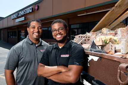 Juan and Brent Reaves, left to right, are the brothers and co-owners of a barbecue joint in...