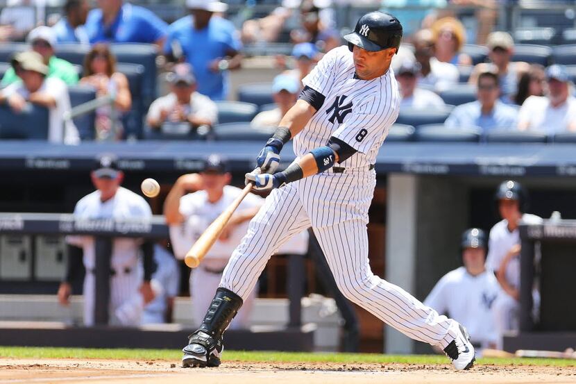NEW YORK, NY - JULY 24:  Carlos Beltran #36 of the New York Yankees hits a solo home run in...