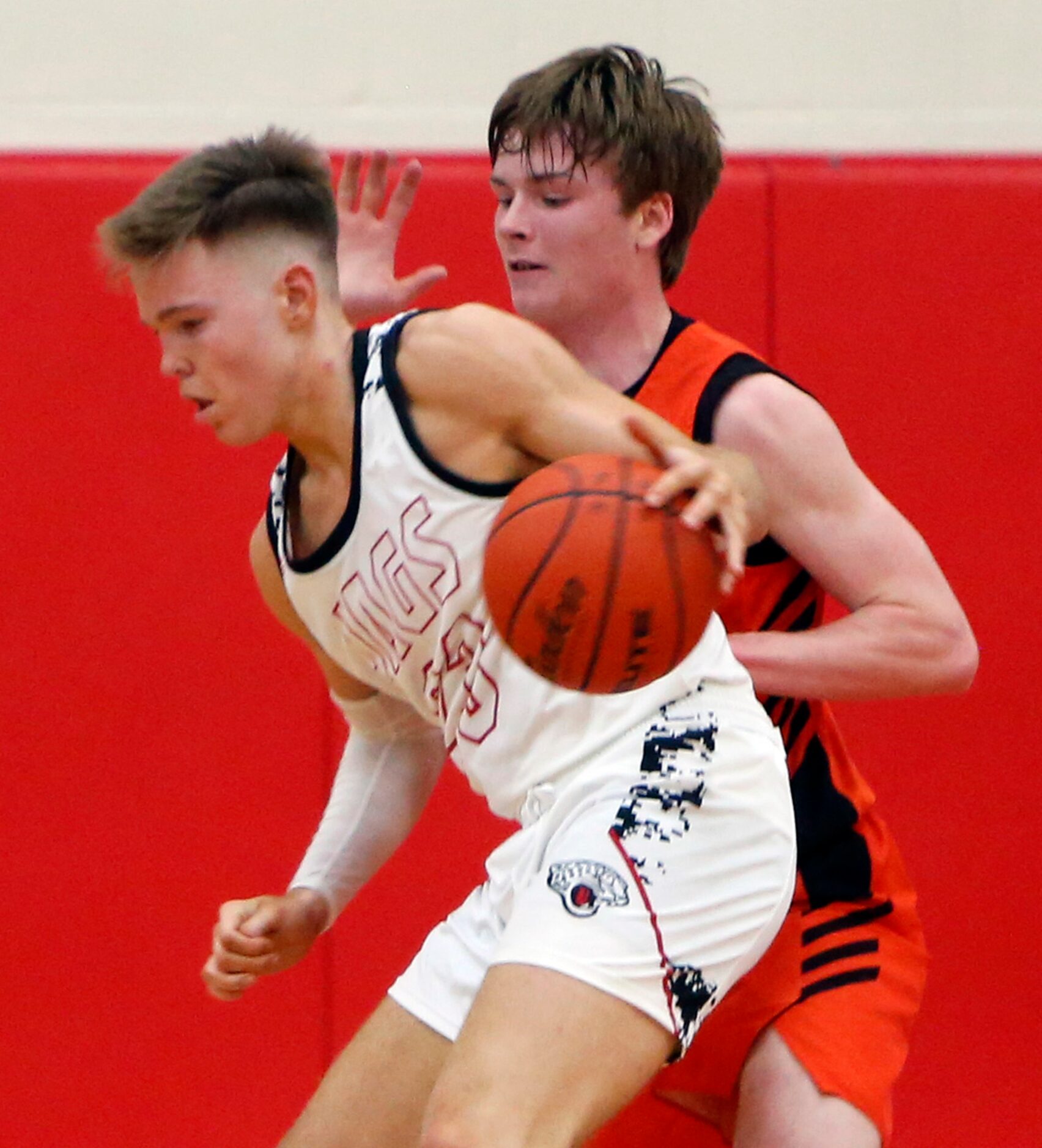 Mesquite Horn's Preston Aymond (23) controls the ball as he is covered defensively by...