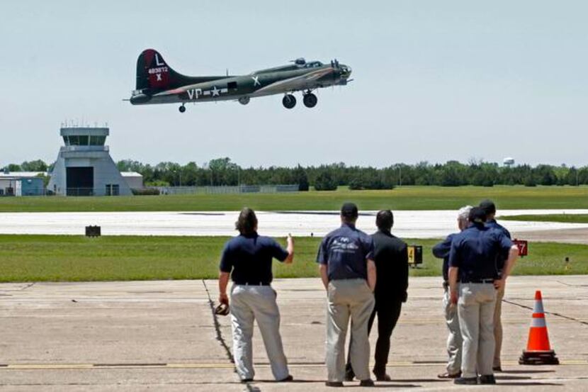 
A B-17G bomber takes off from Dallas Executive Airport, its future home base. The B-17...