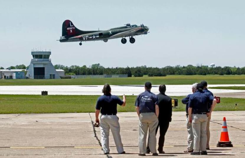 
A B-17G bomber takes off from Dallas Executive Airport, its future home base. The B-17...