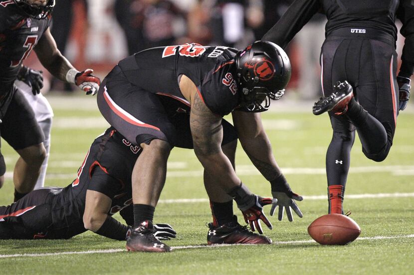 Utah's Star Lotulelei (92) goes after a fumble the first half during an NCAA college...