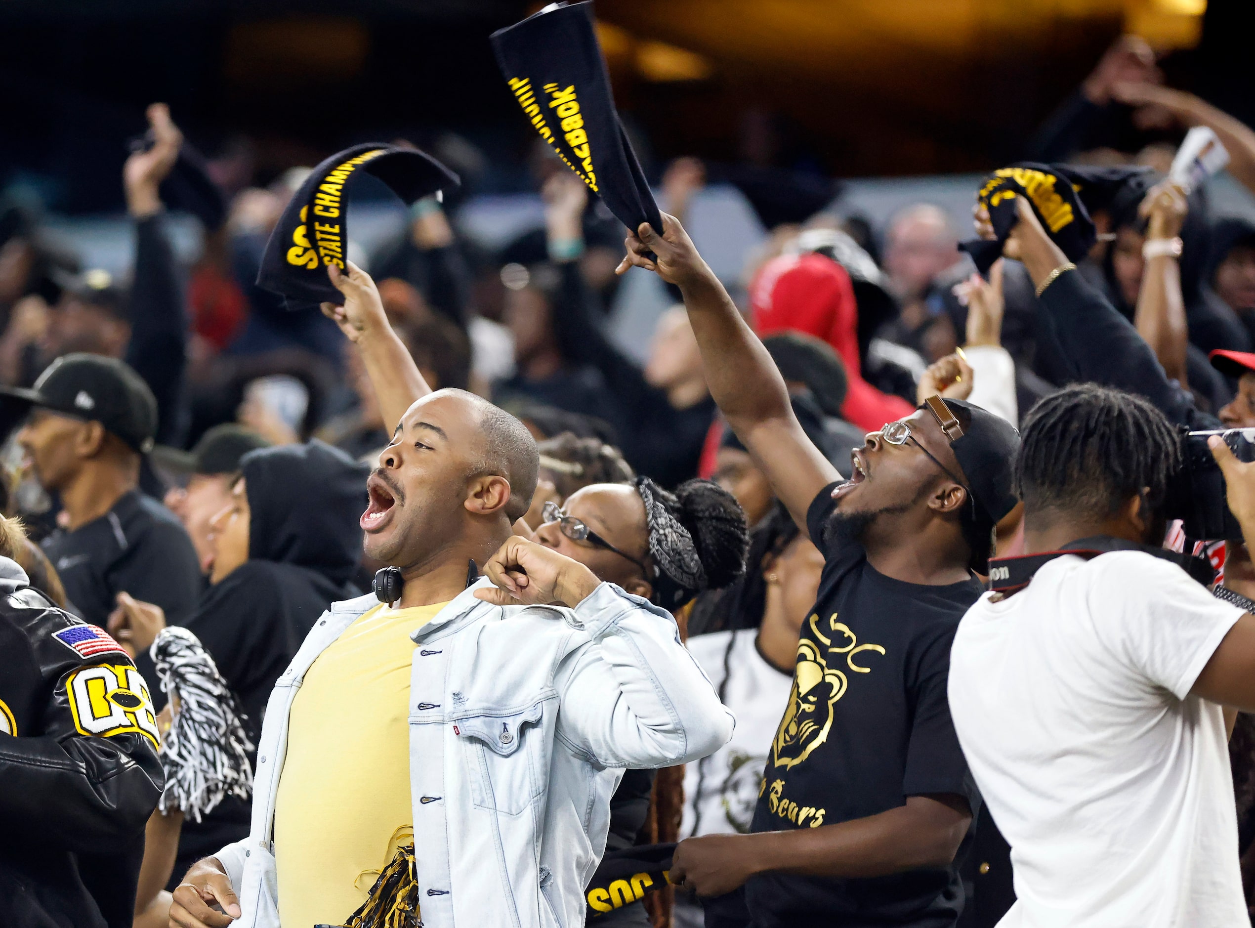 South Oak Cliff fans cheer on their team during the third quarter of the Class 5A Division...