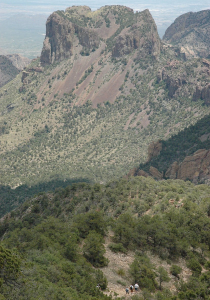 Casa Grande Peak looms over hikers on the Emory Peak Trail in Big Bend National Park.