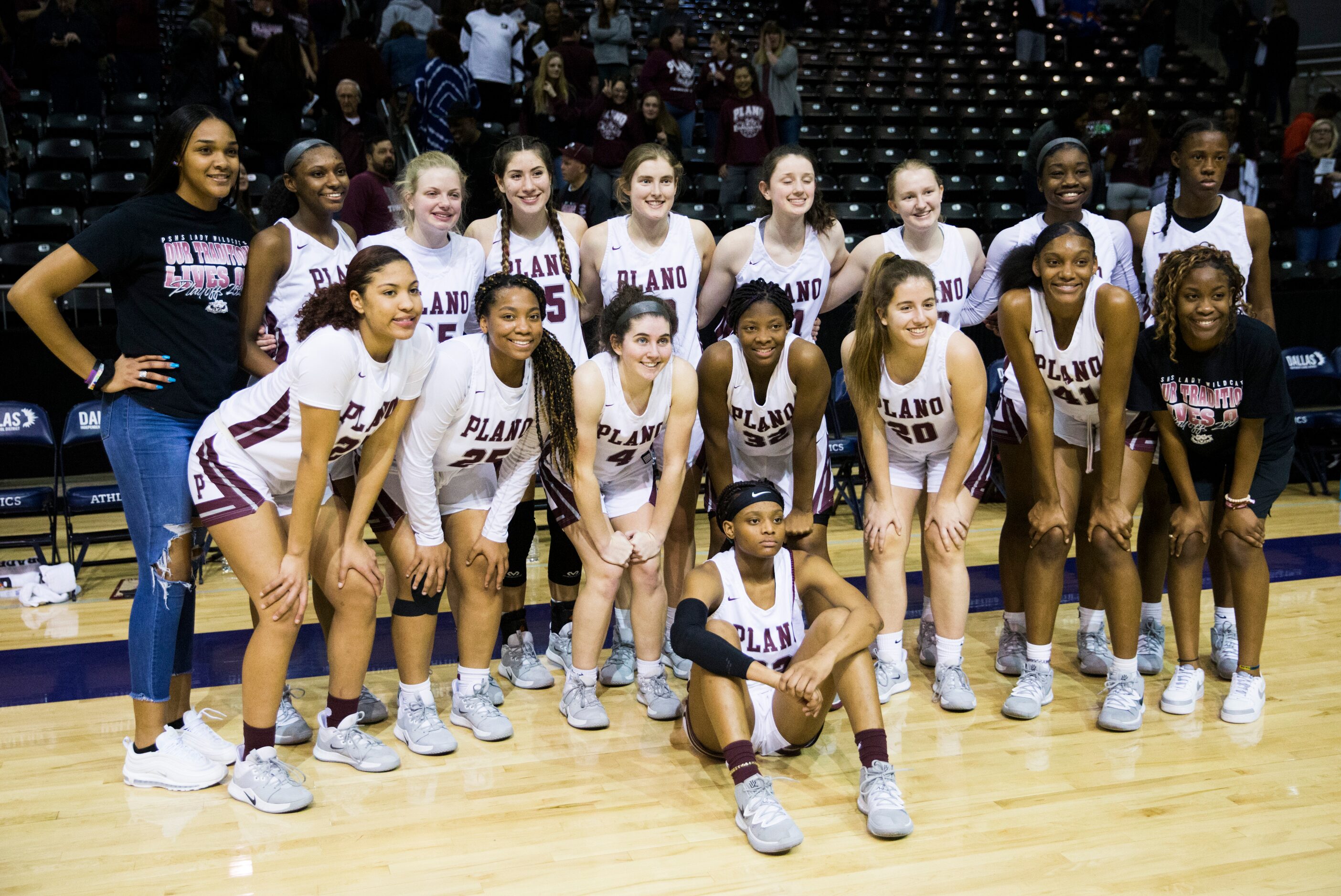 Plano celebrates a 60-46 win after a UIL 6A Region II semifinal girls basketball game...