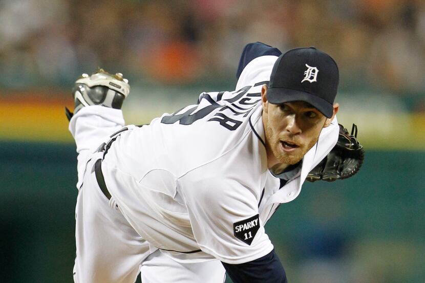 Detroit Tigers starting pitcher Doug Fister (58) throws a pitch in the 2nd inning during...