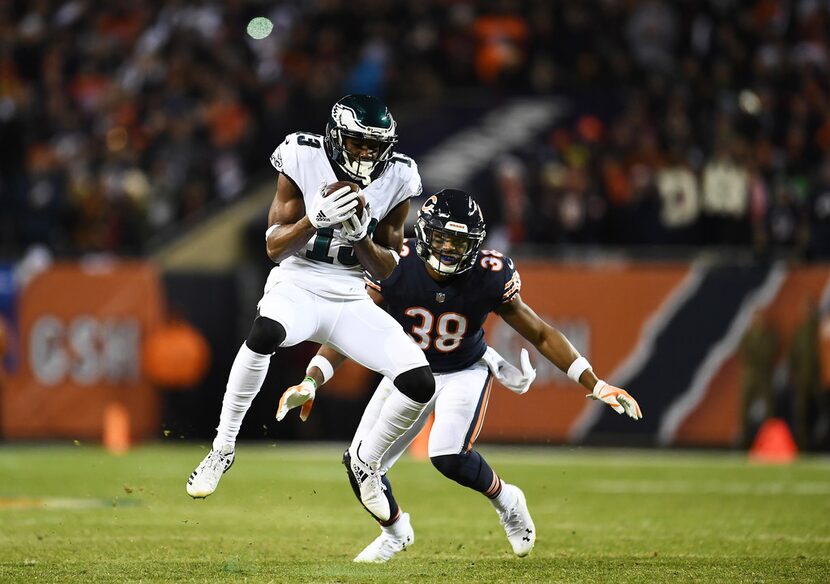 CHICAGO, ILLINOIS - JANUARY 06:  Nelson Agholor #13 of the Philadelphia Eagles completes a...