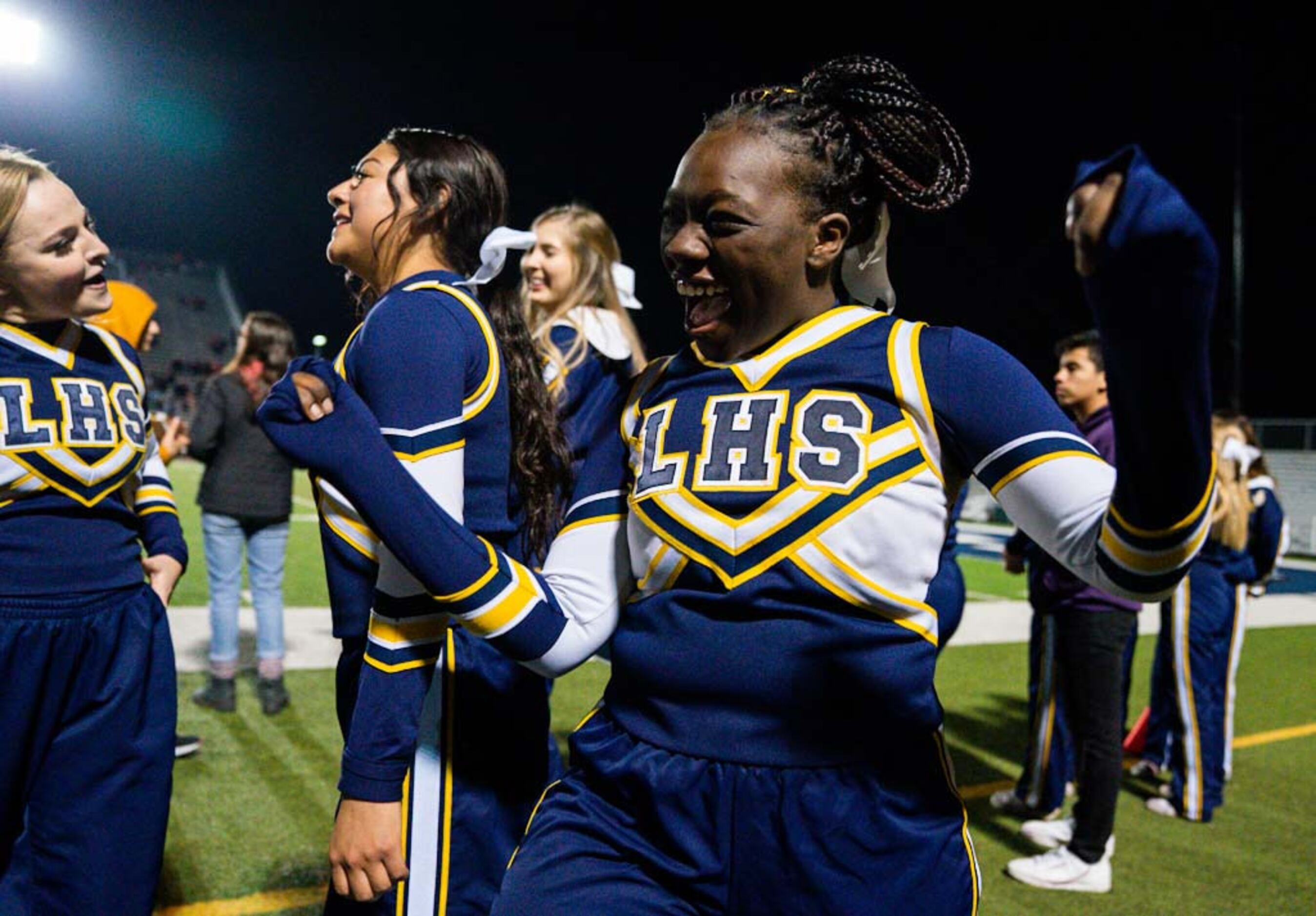Arlington Lamar cheerleaders celebrate during the fourth quarter of a UIL Class 6A Division...