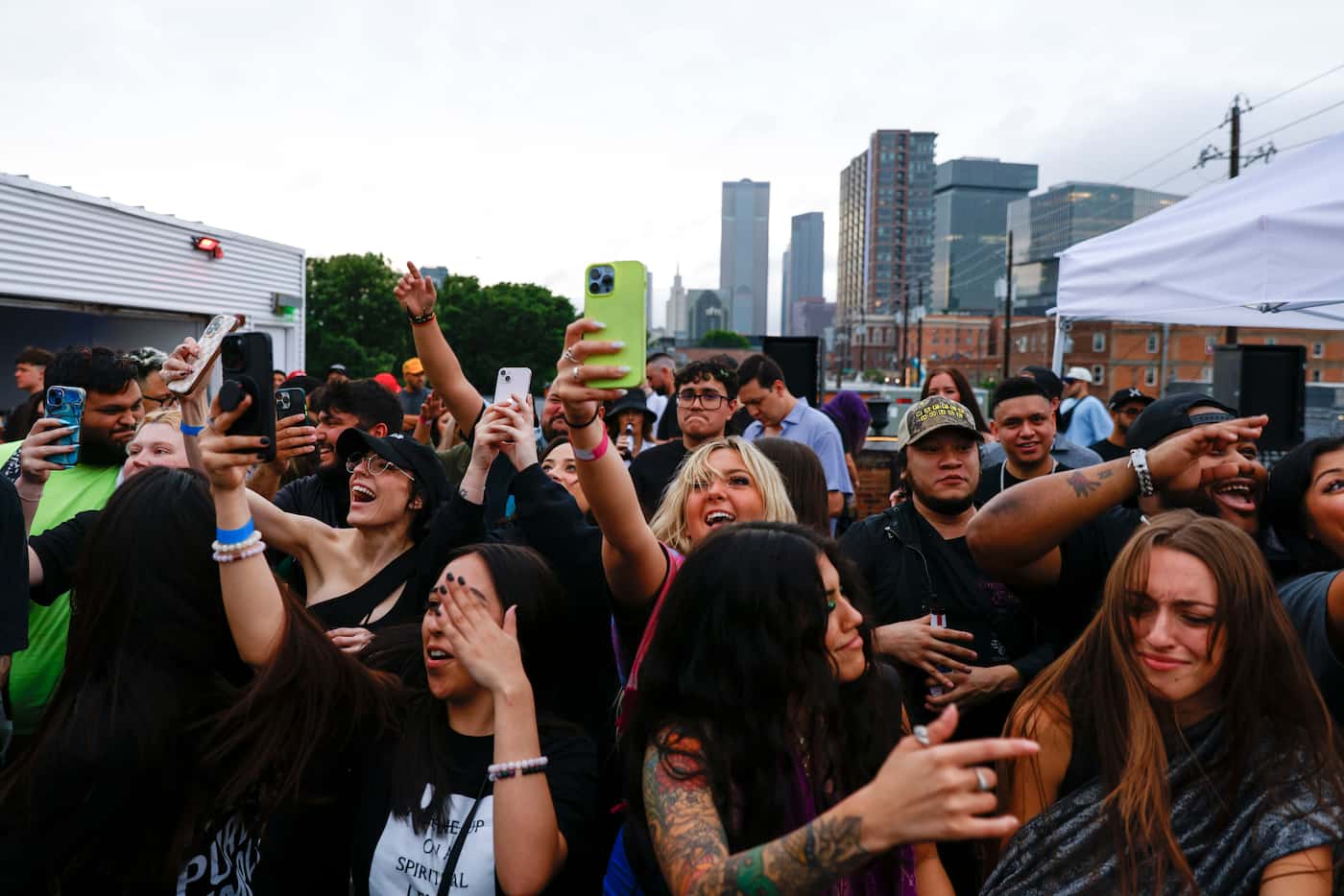 Crowd dances during a surprise pop up show with DJ Svdden Death and Marshmello, on Friday,...