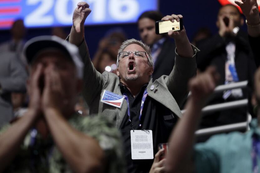 People reacted to Texas Sen. Ted Cruz as he addressed delegates Wednesday at the Republican...