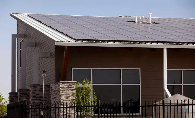 Arborilogical Services features a roof that is covered in solar panels. 