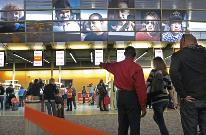 Passengers are directed to use the Automated Passport Control system at D/FW.