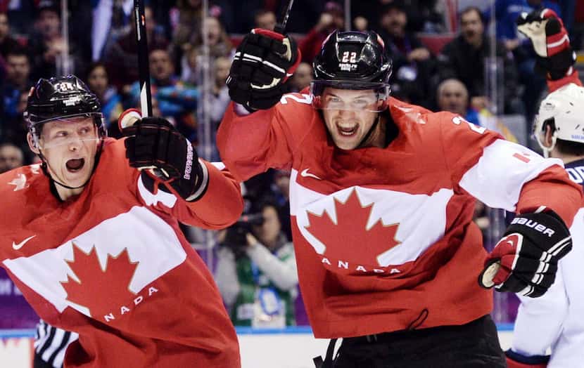 Canada's Jamie Benn (right) celebrates scoring his team's first goal during the Men's Ice...