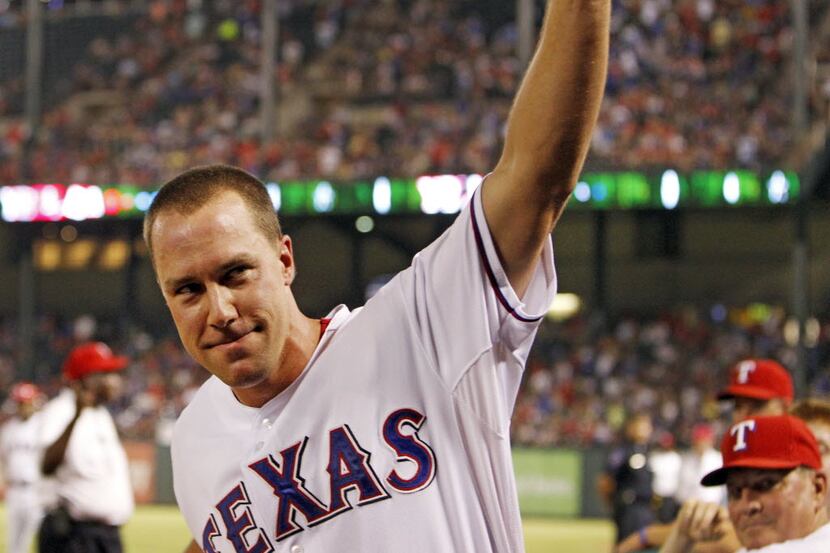 THE CAREER OF RANGERS OUTFIELDER DAVID MURPHY: Texas DH David Murphy acknowledges the crowd...