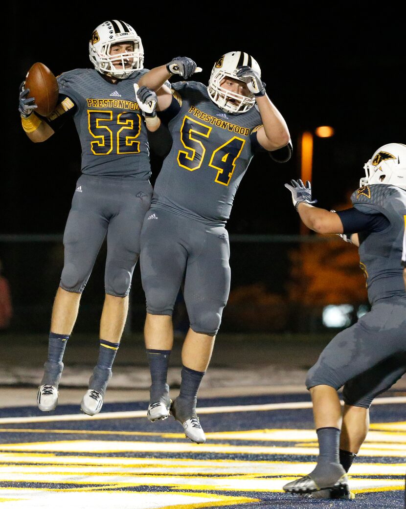 Preestonwood linebacker Jack Wajerski (52) celebrates his third quarter interception with...