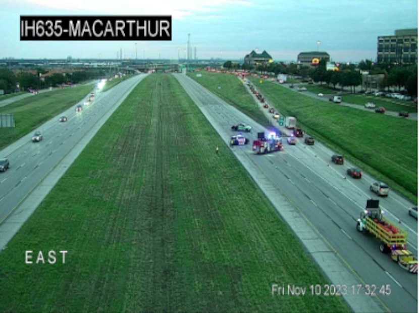 A Texas Department of Transportation traffic camera showed police cars had blocked off...